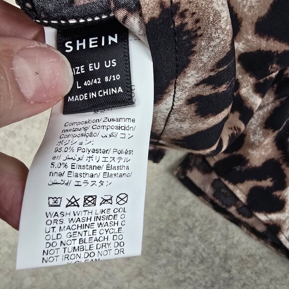 Womens Long Sleeve Leopard Print Blouse With Decorative Black Flower Accents - Picture 4 of 6